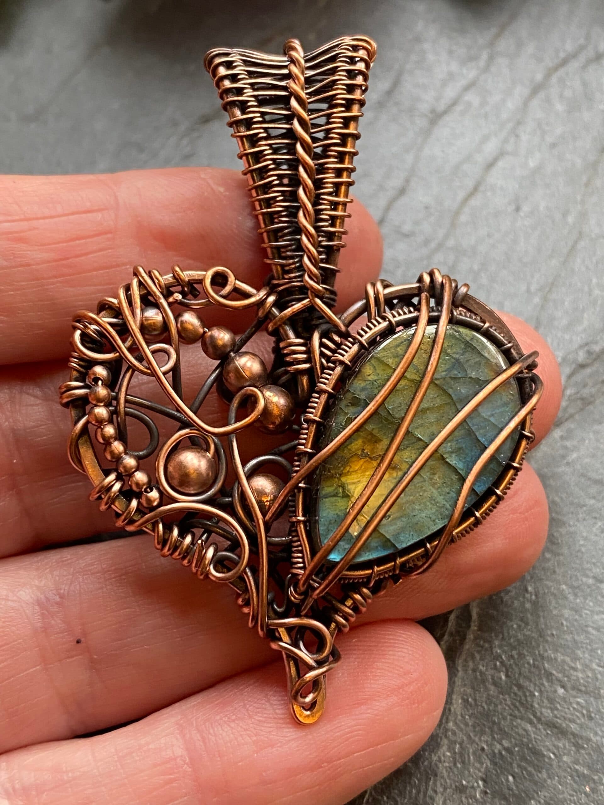 Copper wire wrapped heart pendant with teardrop labradorite in chaos weave setting on handmade copper chain