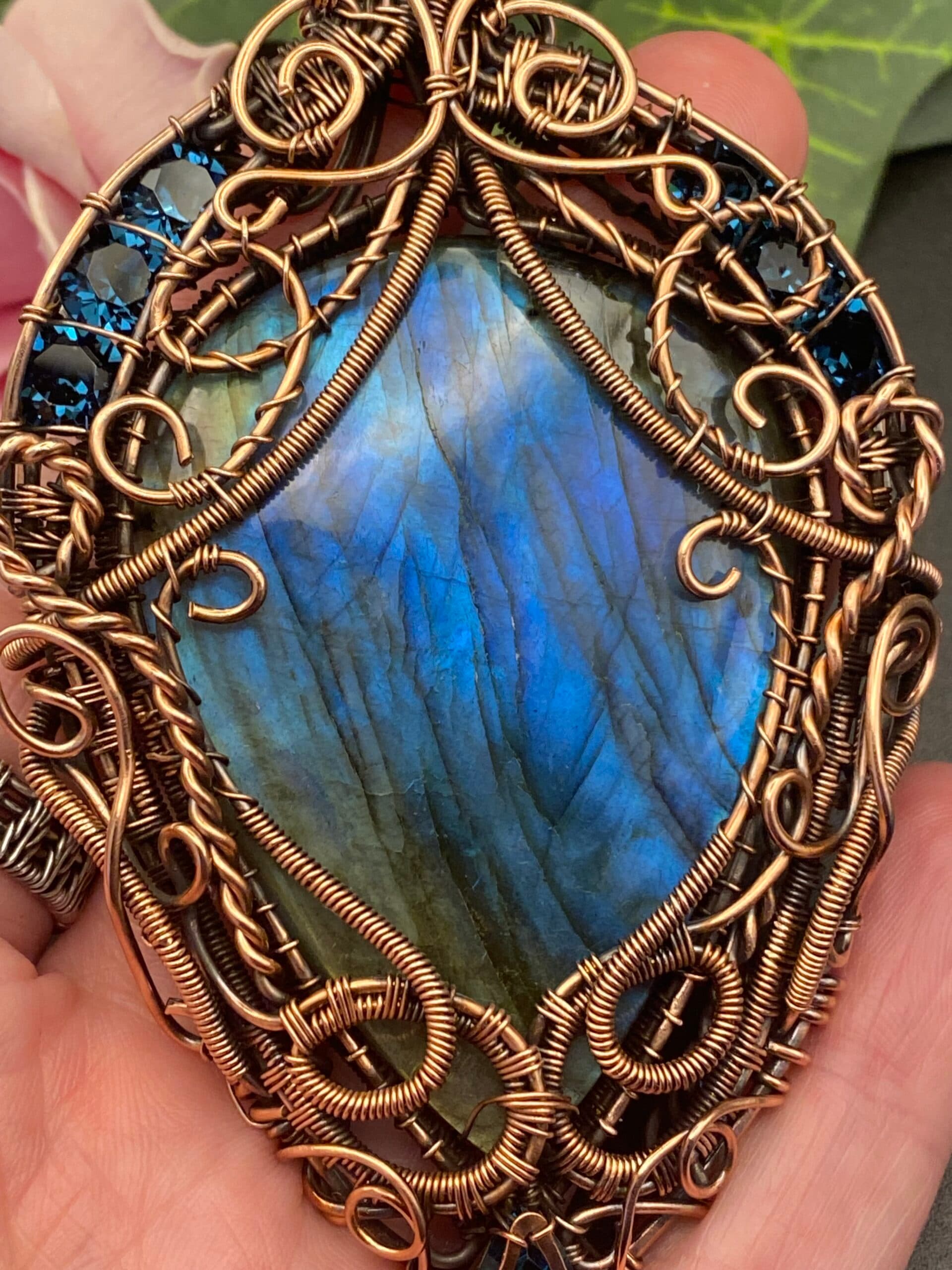 Large blue flash labradorite statement necklace wrapped in bare copper wire with intricate wirework and vintage Swarovski crystal accent