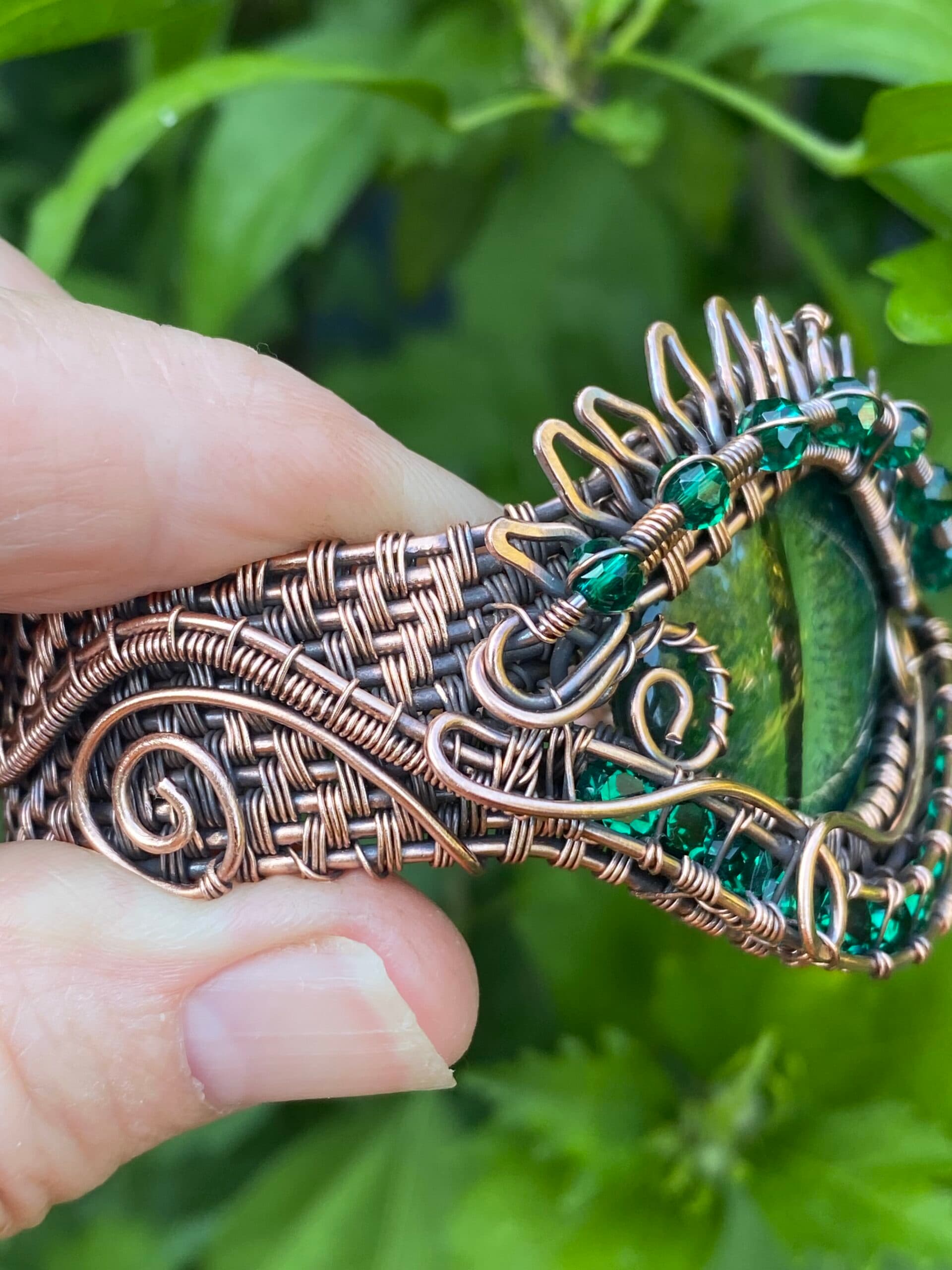 Forest Dragon copper cuff bracelet with hand painted blue green dragon eye and 11 strand woven copper design
