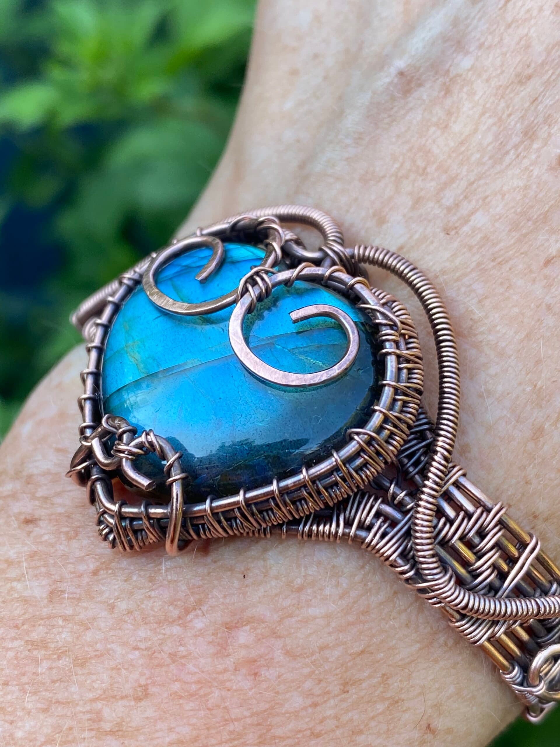 Heart shaped blue flash Labradorite copper cuff bracelet with seven strand handwoven copper band