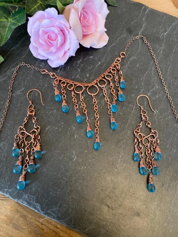 Bare Copper Wire and blue glass tear drop dangle necklace with matching copper earrings