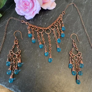 Bare Copper Wire and blue glass tear drop dangle necklace with matching copper earrings