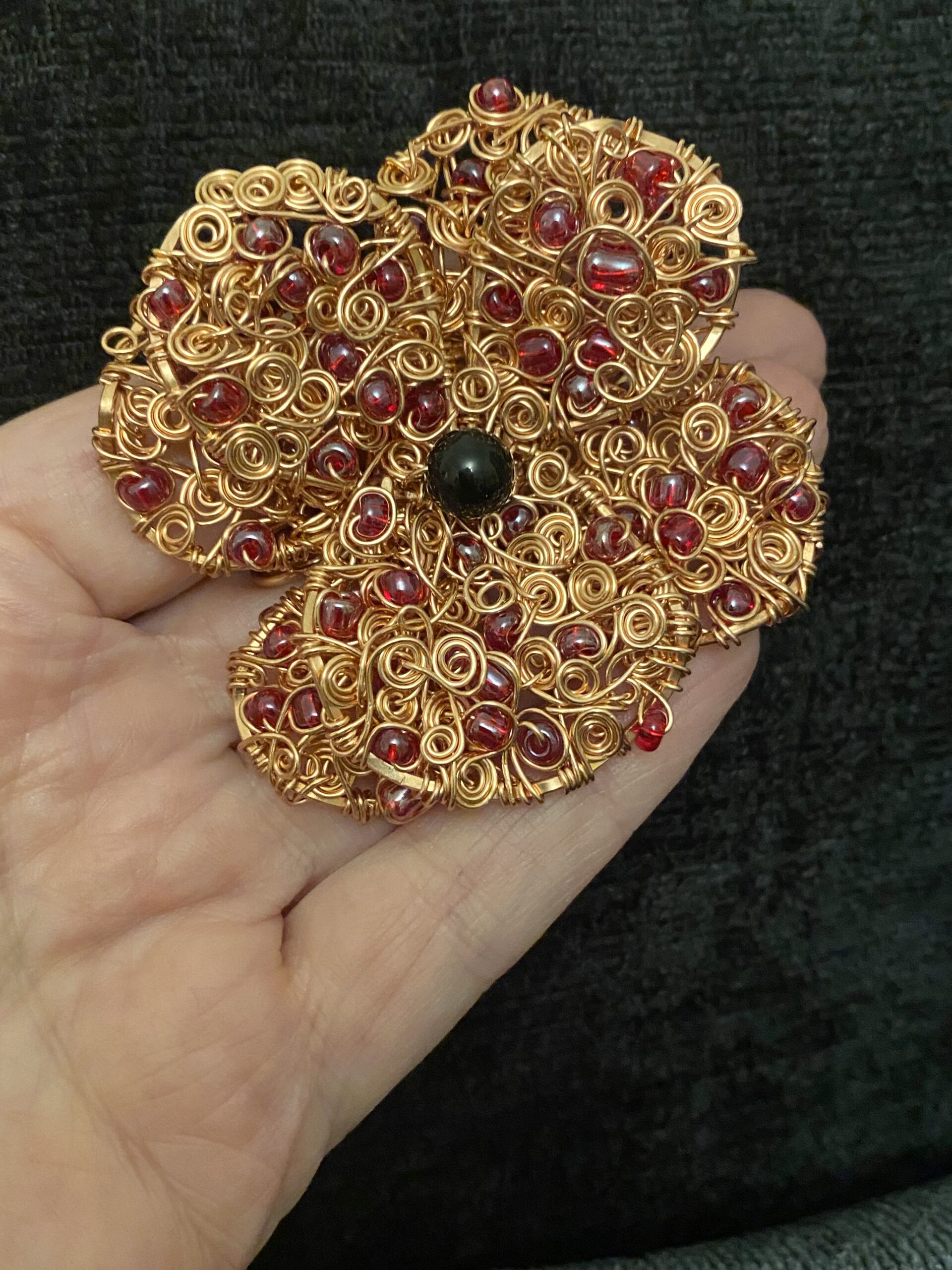 Handmade Copper Wire Poppy Brooch with Onyx Centre - Image 6