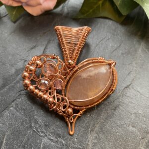 Copper wire wrapped heart pendant with peach moonstone and pink beads on handmade copper chain