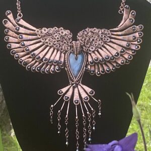 Viking Raven Necklace featuring Labradorite centre stone, black faceted beads, and intricate wire weaving inspired by Norse mythology.