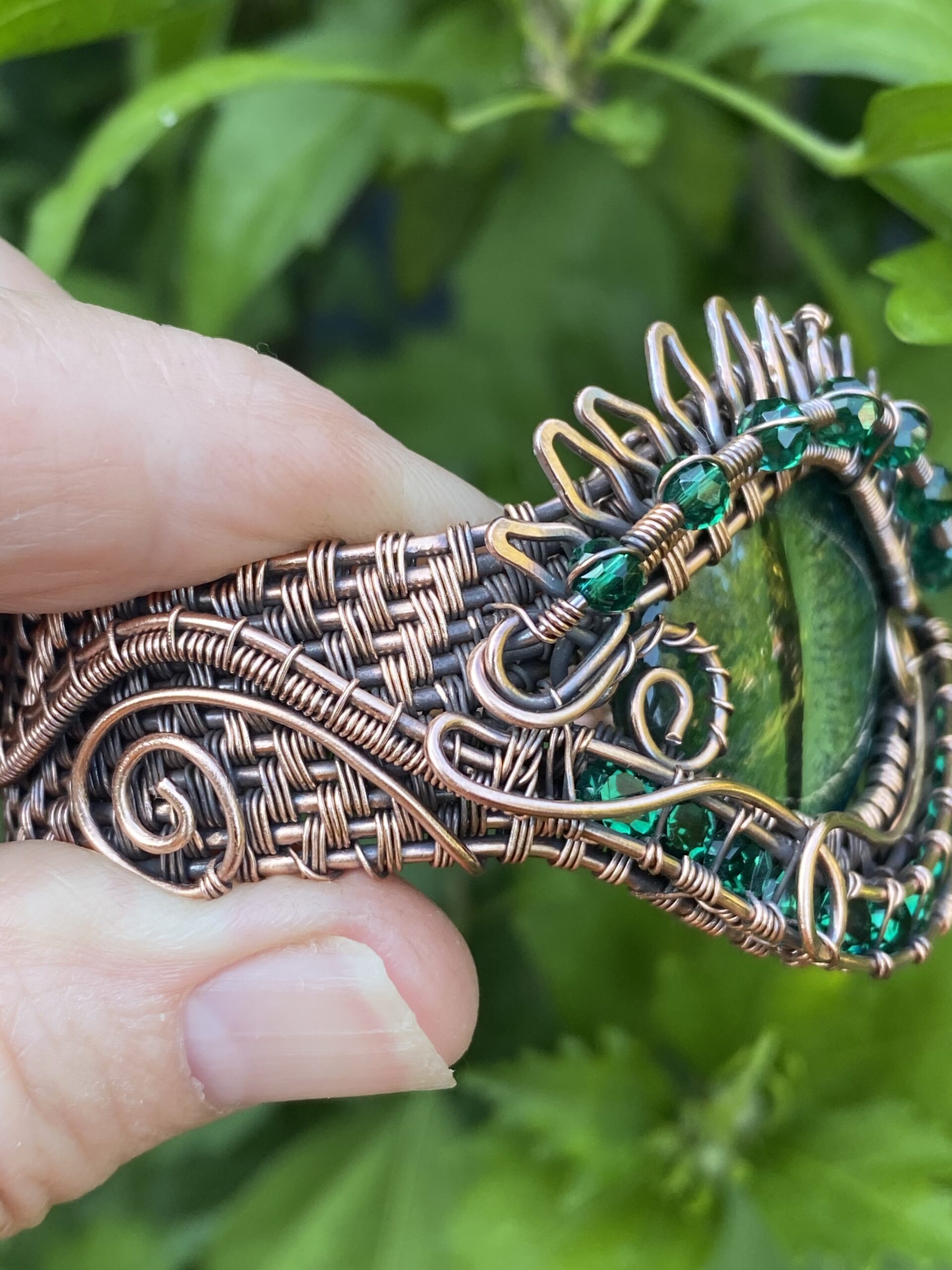 Forest Dragon copper cuff bracelet with hand painted blue green dragon eye and 11 strand woven copper design