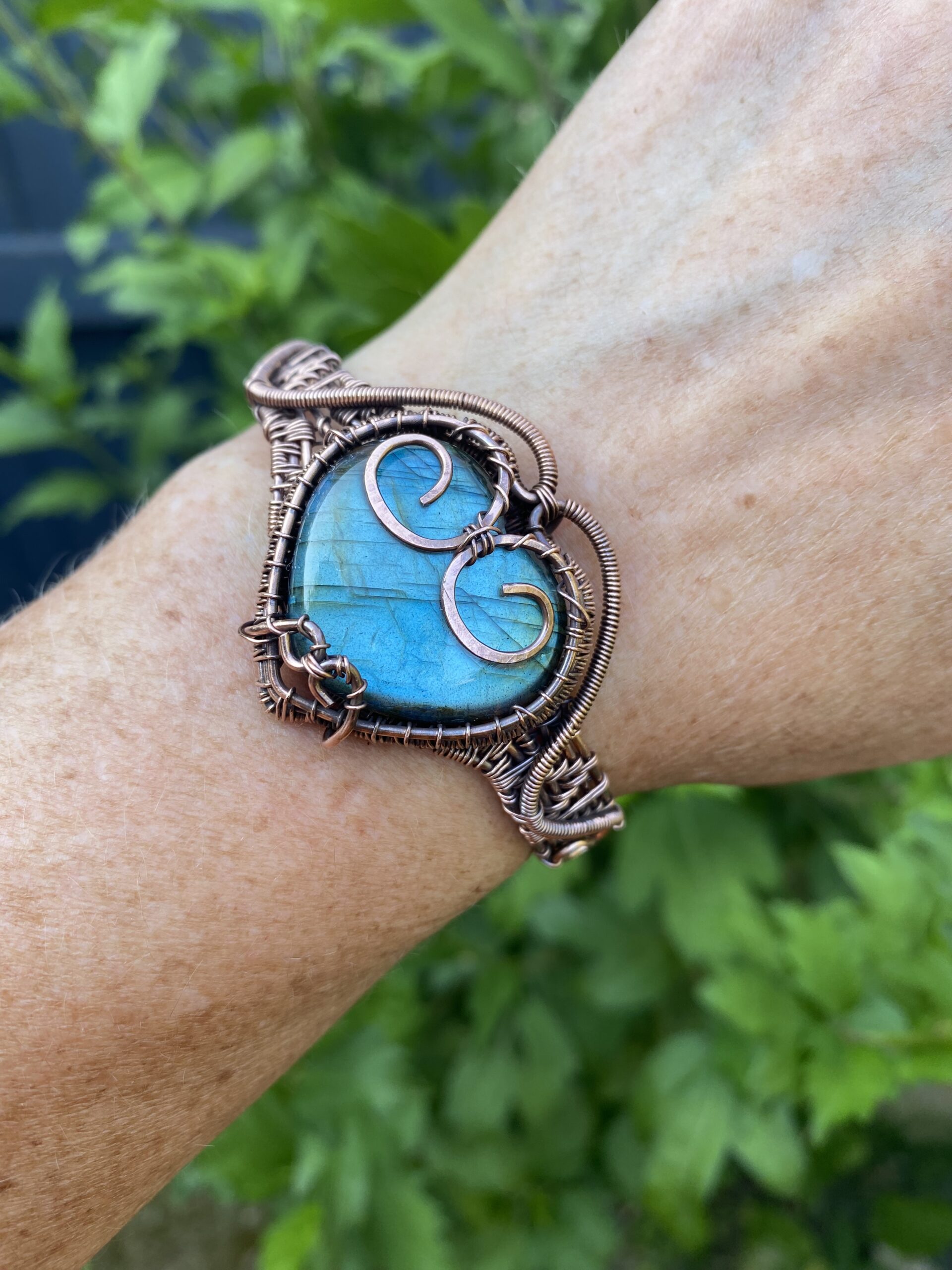 Heart shaped blue flash Labradorite copper cuff bracelet with seven strand handwoven copper band